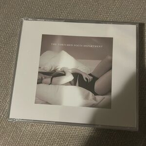 Brand new  sealed The Tortured Poets Department CD with artifacts